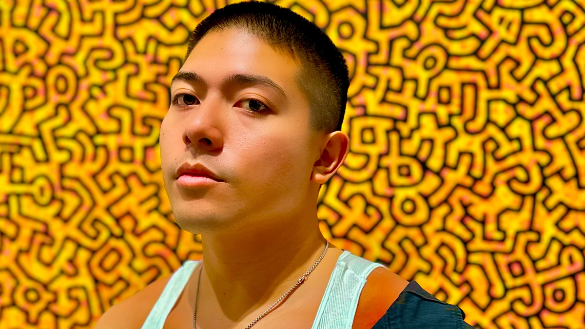 Luke Alexander in a white tanktop - dark short hair